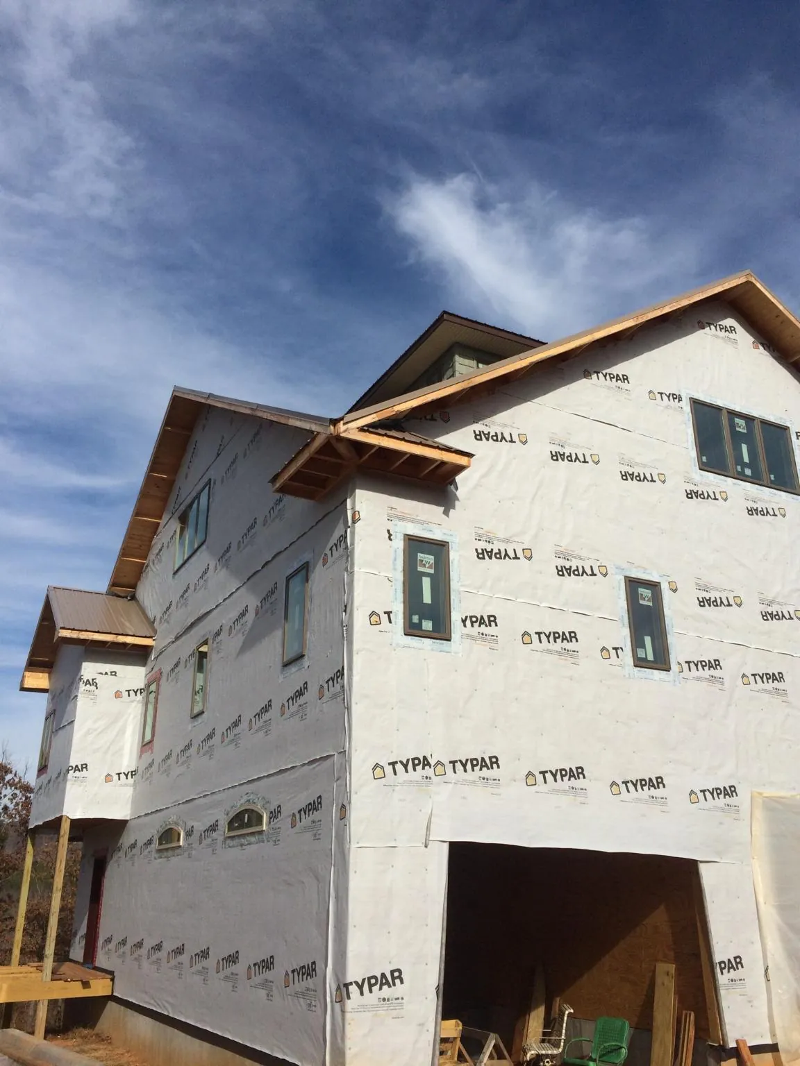 Stick built house wrapped in Typar with new roof framing and dormers in Ferguson